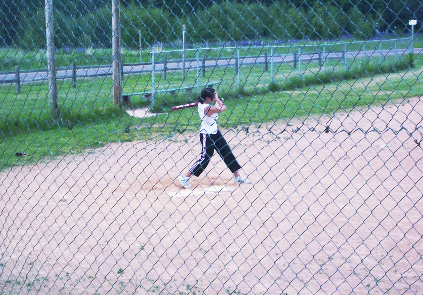 Building 21st-Century Skills Through Travel by Experiential Learning Depot - This photo is an example of building collaboration skills, one of the 6C's of education. This student traveled with school on a service learning trip, and not only gave her time to the community, but immersed herself in it. She is playing in a community baseball game. 