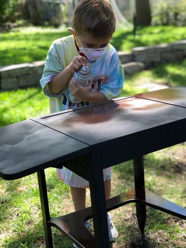 Design thinking project idea: turning an old grill table into a science station.