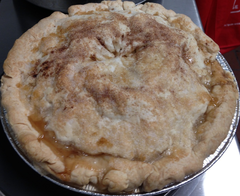 A photo of a student made apple pie for a holiday fundraiser.