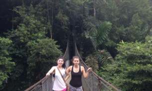 High school biology trip to Costa Rica - This is a photo of students observing biodiversity from hanging bridges in Arenal Volcano National Park. 
