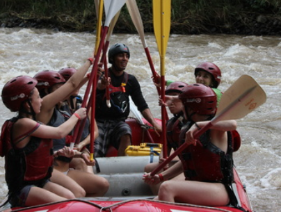 Photo of students white water rafting in Costa Rica on a high school biology trip. This photo really captures a part of what is so valuable about traveling. They are practicing teamwork, communication, and building deep relationships. 
