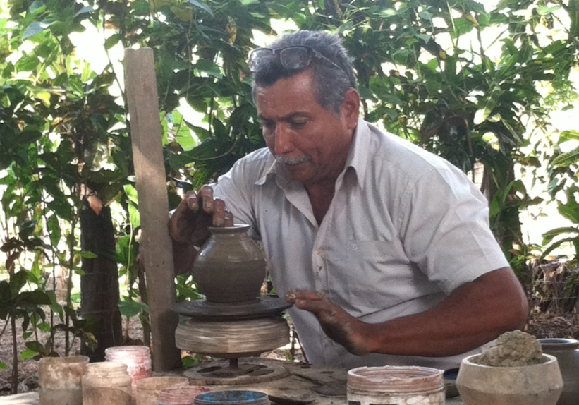 High school biology trip to Costa Rica - this is a photo of a man making traditional pottery in the town of Guaitil. 