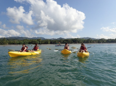 High school biology trip to Costa Rica - this is a photo of students kayaking to our snorkeling destination to get an underwater view of Costa Rica's marine diversity.